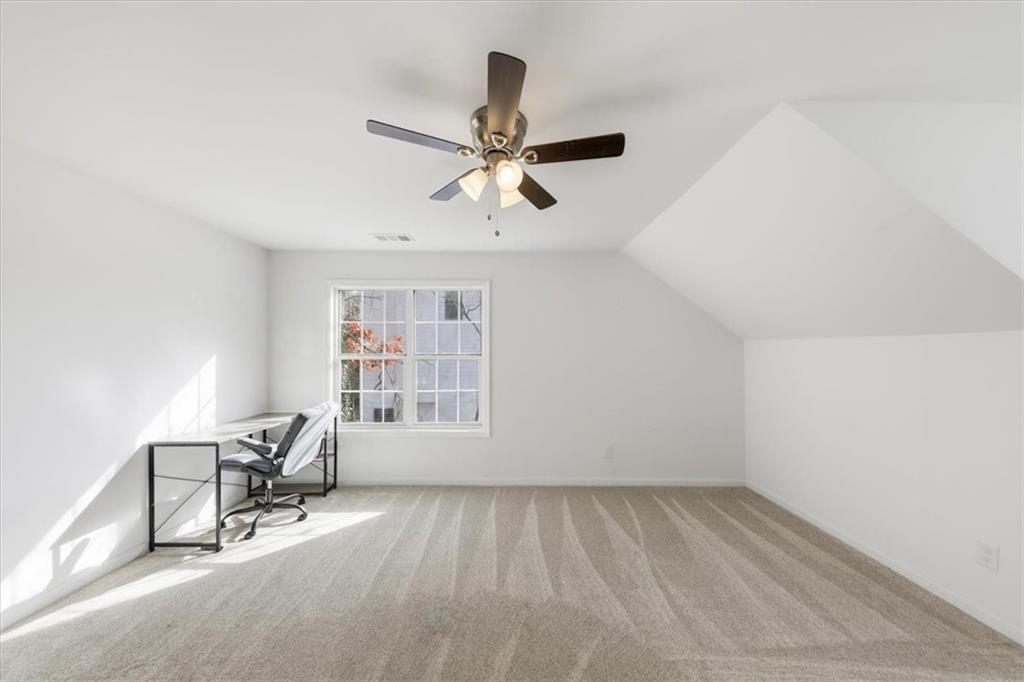 2769 Springfount Trail Northeast Lawrenceville, GA 30043 - Photo 28 of 52 a view of an empty room with a window