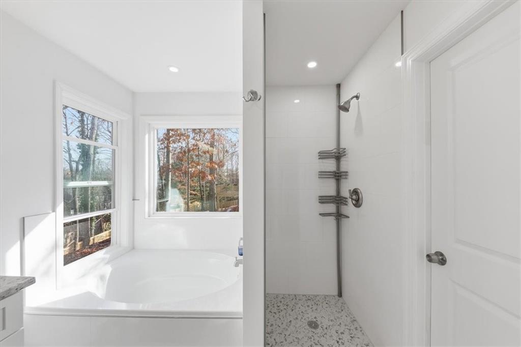 2769 Springfount Trail Northeast Lawrenceville, GA 30043 - Photo 36 of 52 a bathroom with a shower