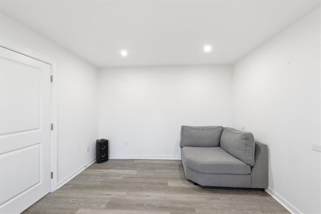 2769 Springfount Trail Northeast Lawrenceville, GA 30043 - Photo 38 of 52 a living room with furniture and a couch