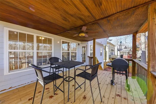a view of a patio with wooden floor