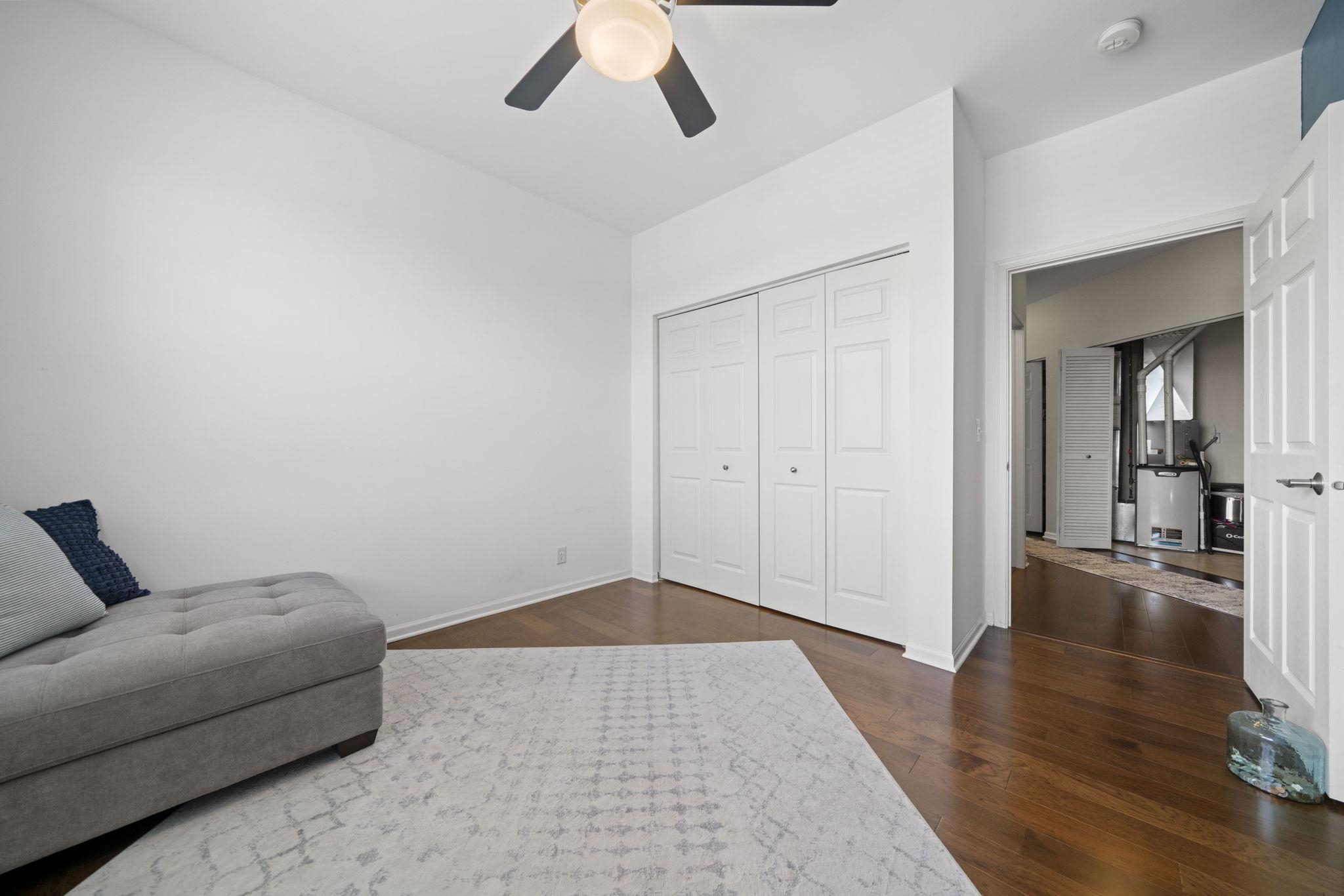7621 Magnolia Trail Cherry Valley, IL 61016 - Photo 19 of 27 a living room with furniture and wooden floor