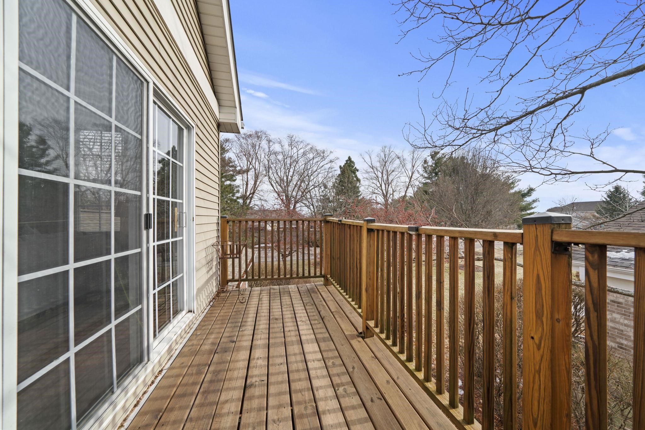 7621 Magnolia Trail Cherry Valley, IL 61016 - Photo 20 of 27 a view of balcony with wooden floor