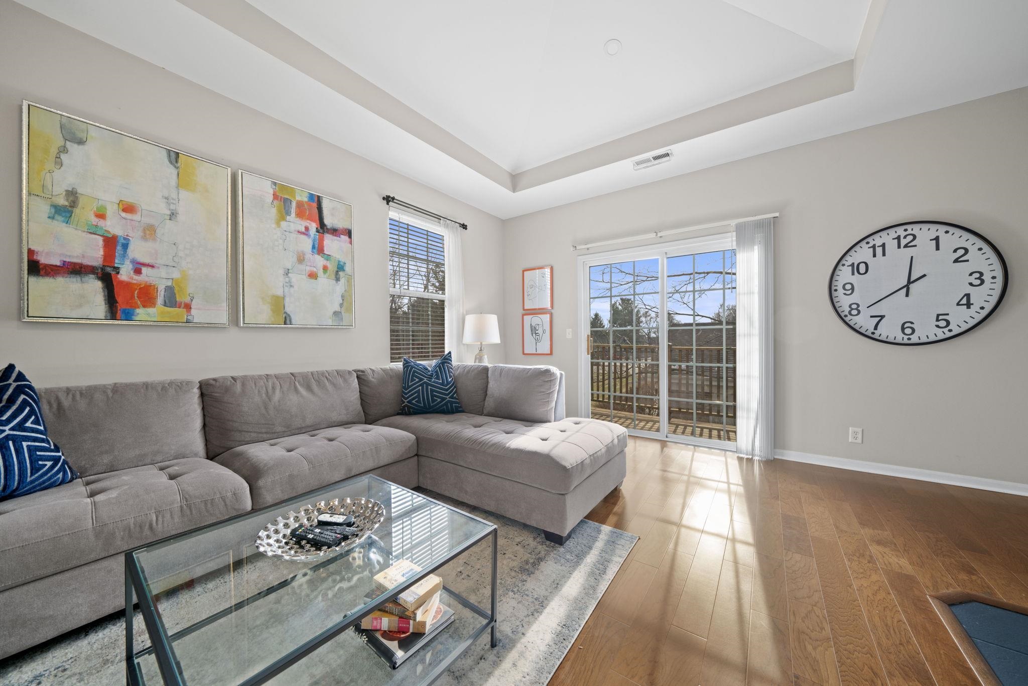 7621 Magnolia Trail Cherry Valley, IL 61016 - Photo 10 of 27 a living room with furniture a rug and a window