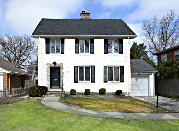 1149 Willow Road Winnetka, IL 60093 - Photo 2 of 37 a front view of a house with a yard