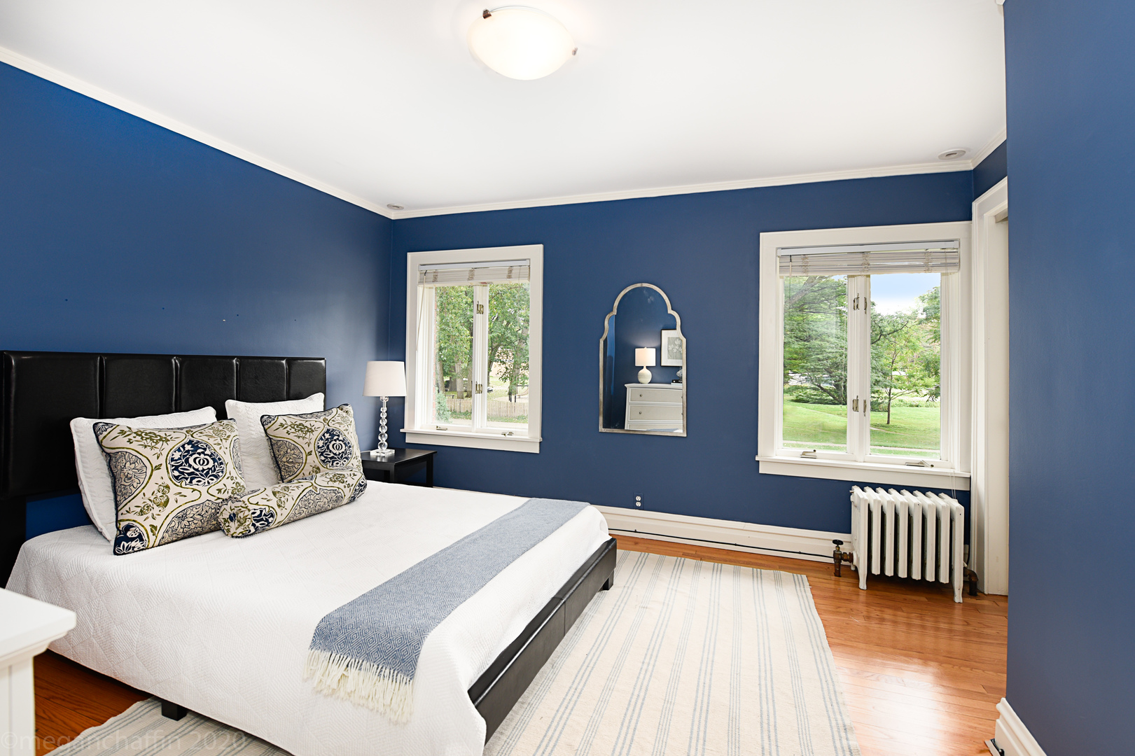 1149 Willow Road Winnetka, IL 60093 - Photo 17 of 37 a bedroom with a bed and a large window