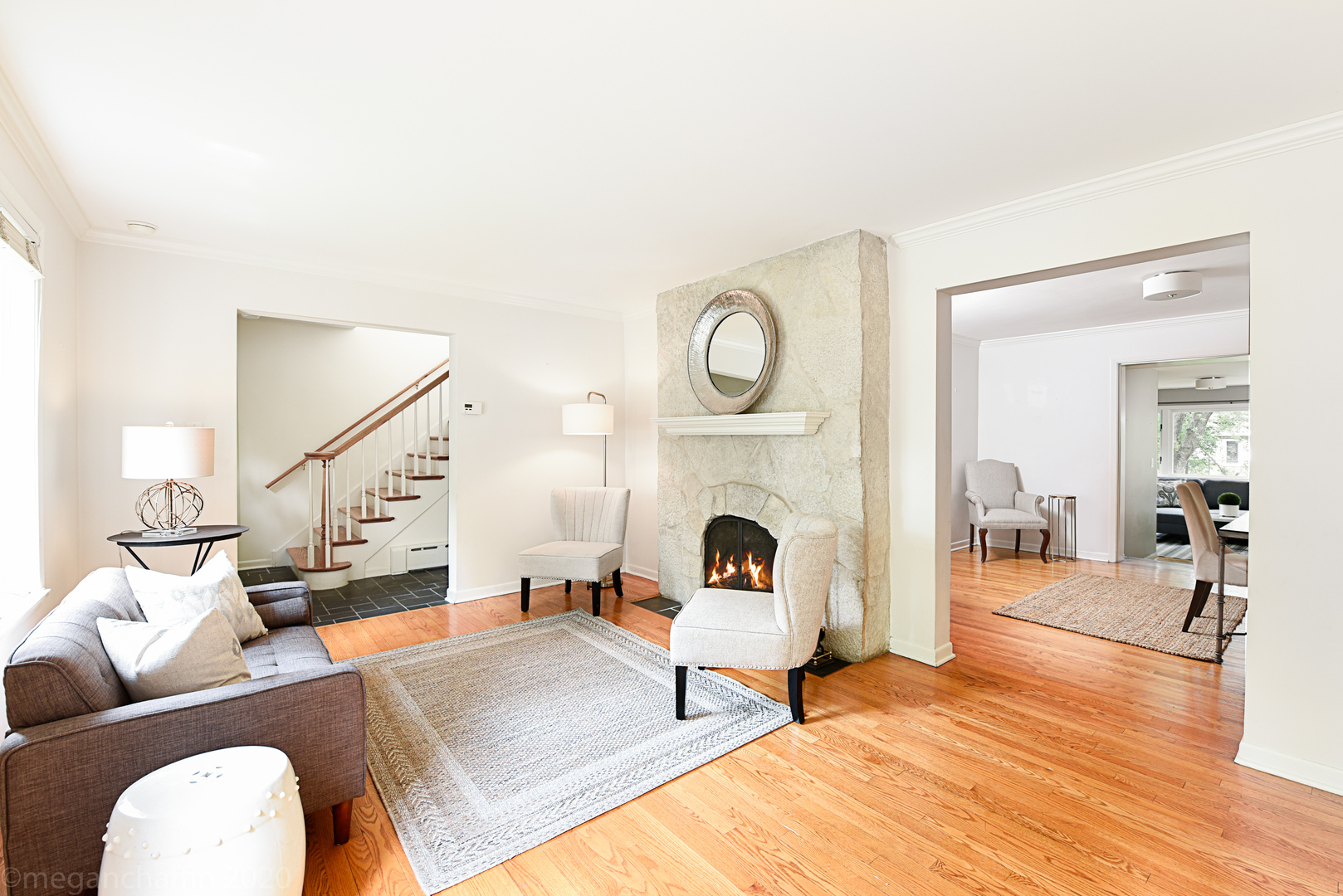 1149 Willow Road Winnetka, IL 60093 - Photo 5 of 37 a living room with furniture and a fireplace