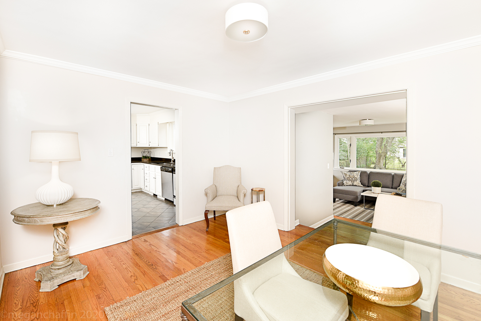 1149 Willow Road Winnetka, IL 60093 - Photo 9 of 37 a living room with furniture and a lamp