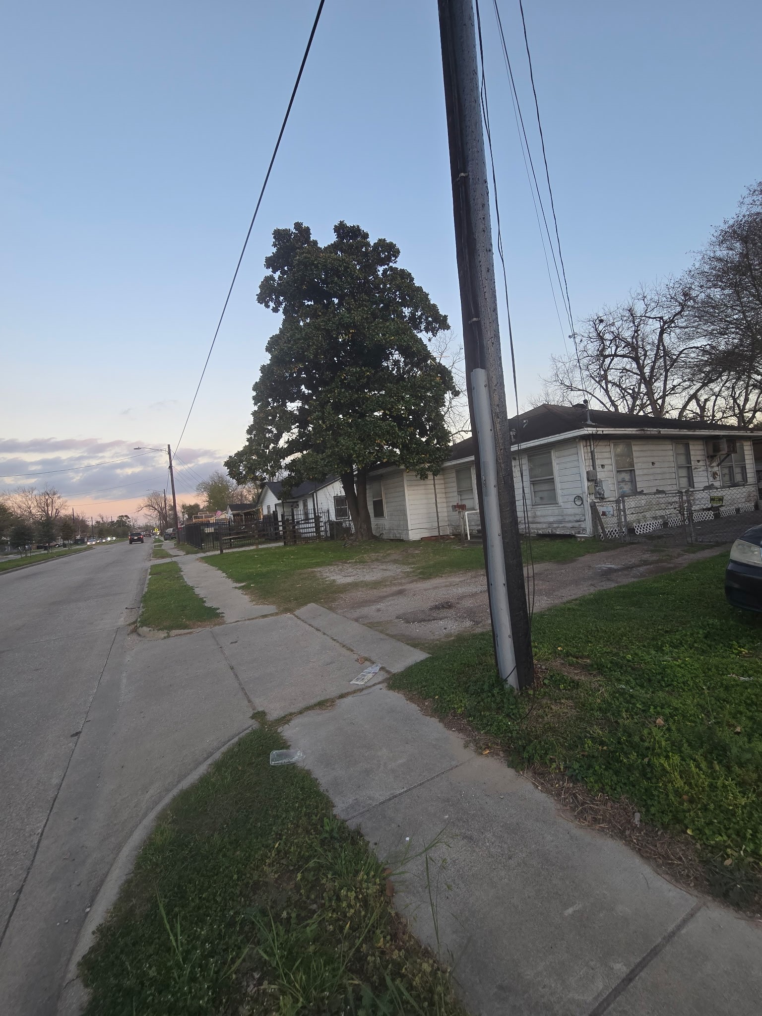 108 Parker Road Houston, TX 77076 - Photo 6 of 9 a view of a street with a building in the background