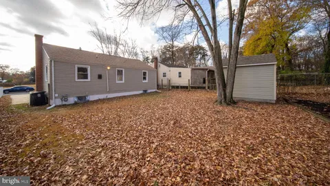 a view of a road with a building in the background