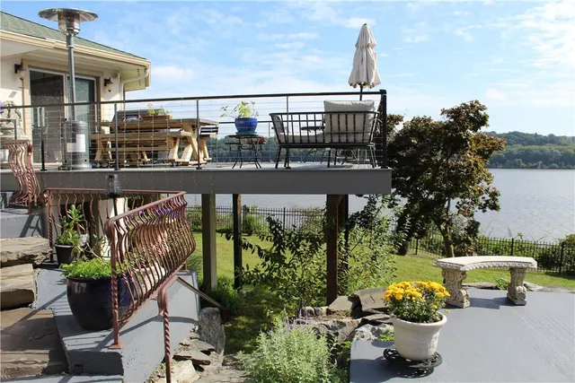 a view of house with patio outdoor seating area
