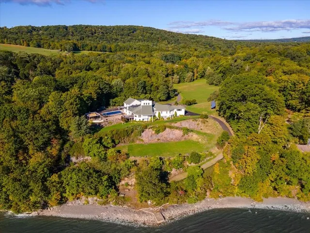 a view of a park with large trees