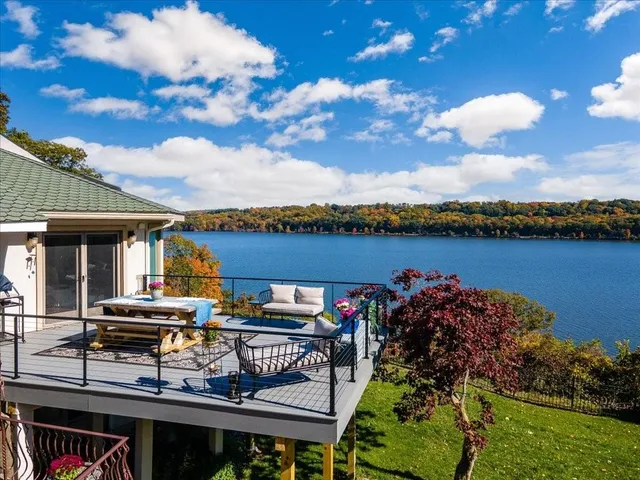 a view of a terrace with furniture and outdoor space