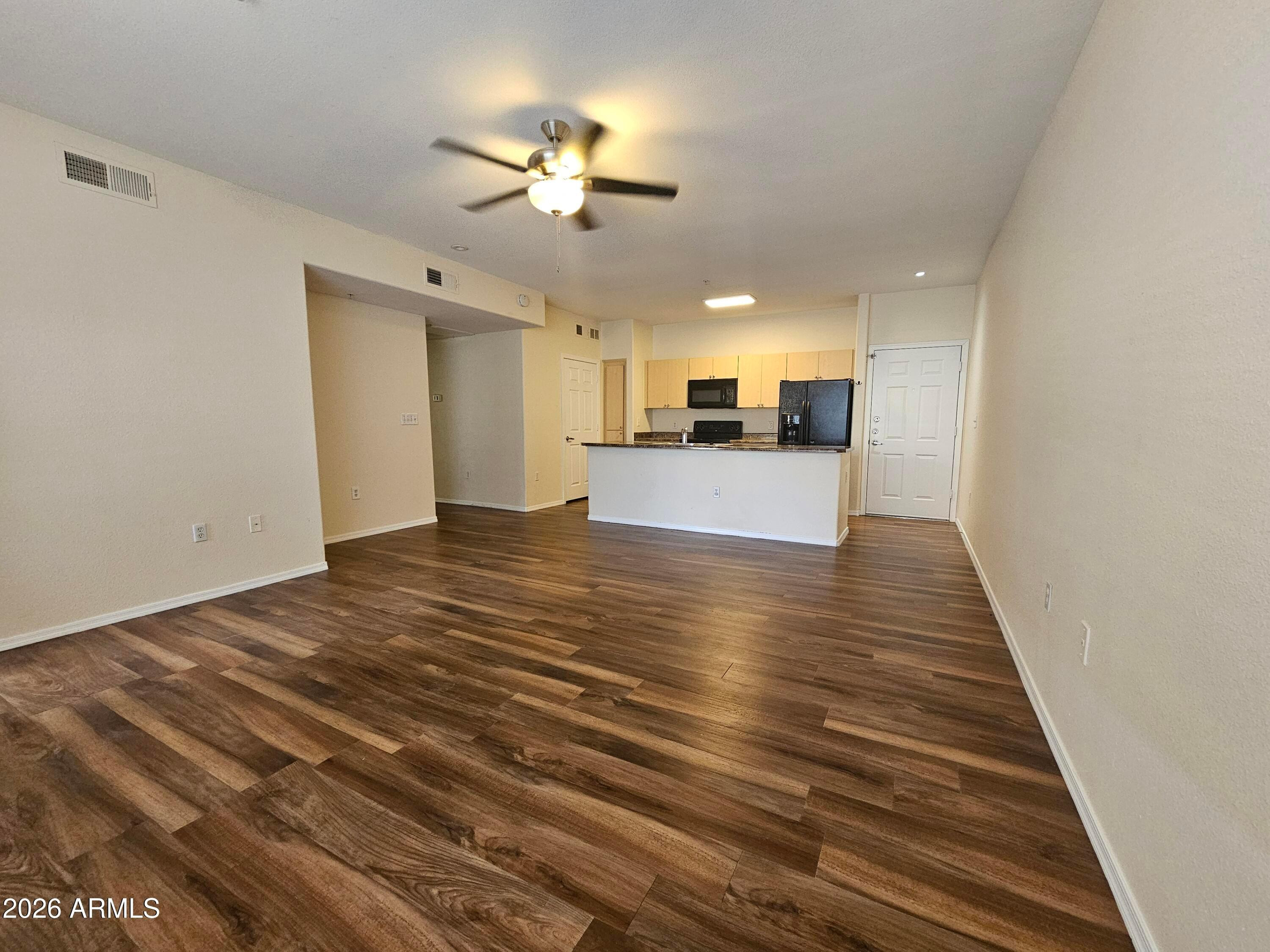 18416 North Cave Creek Road, Unit 2050 Phoenix, AZ 85032 - Photo 3 of 10 a view of a room with a chandelier