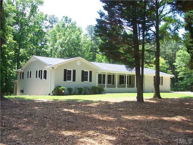 305 Sam Brummitt Road Henderson, NC 27537 - Photo 1 of 24 Front View - Level Lot - Great view of Neighborhood, Horse Farm, Golf Carts going by, etc.