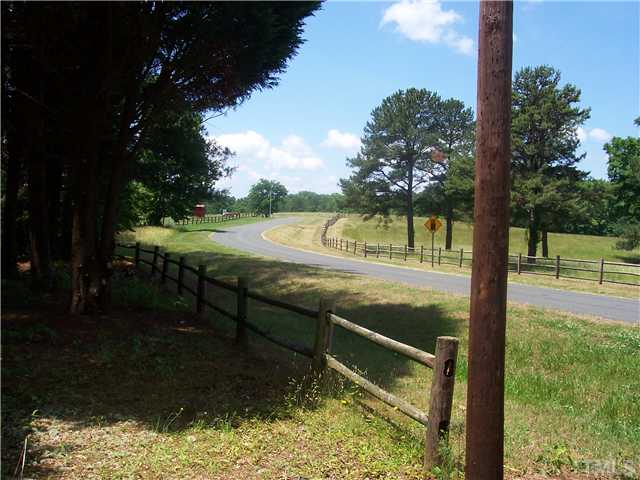 305 Sam Brummitt Road Henderson, NC 27537 - Photo 4 of 24 Next Door Horse Farm view from Driveway