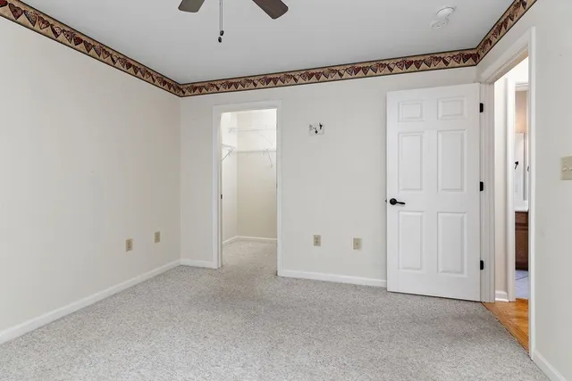 a view of room with walk in closet