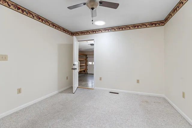 a view of a room with an empty space