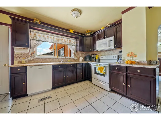a kitchen with a cabinets and counter space