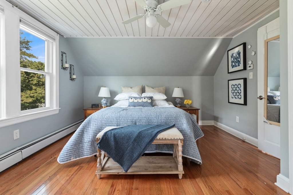 3 Webster Avenue Methuen, MA 01844 - Photo 18 of 34 a bed sitting in a bedroom next to a window