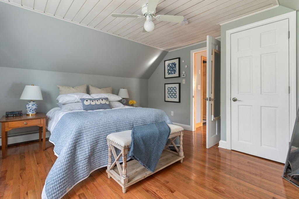 3 Webster Avenue Methuen, MA 01844 - Photo 19 of 34 a bedroom with a bed and wooden floor