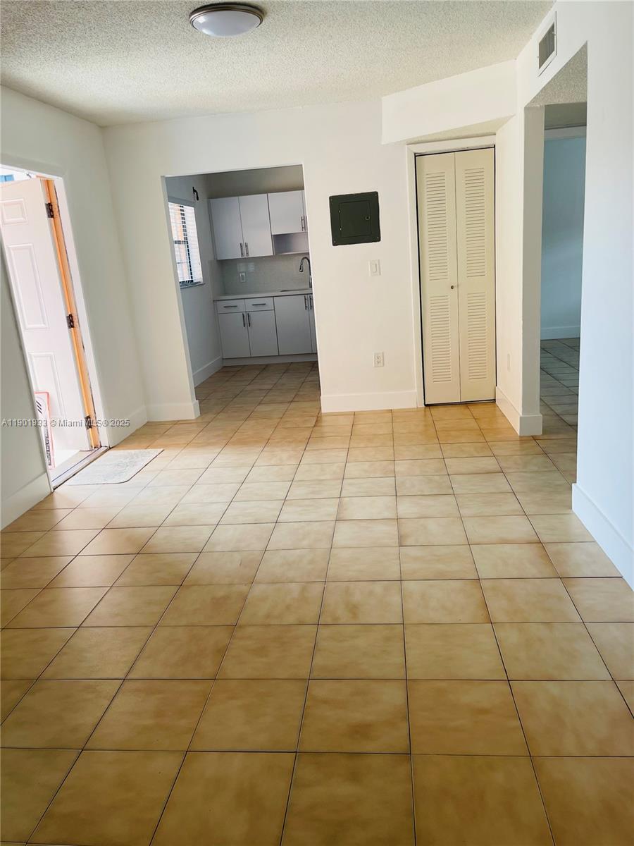 61 West 23rd Street, Unit 104 Hialeah, FL 33010 - Photo 11 of 17 a view of utility room