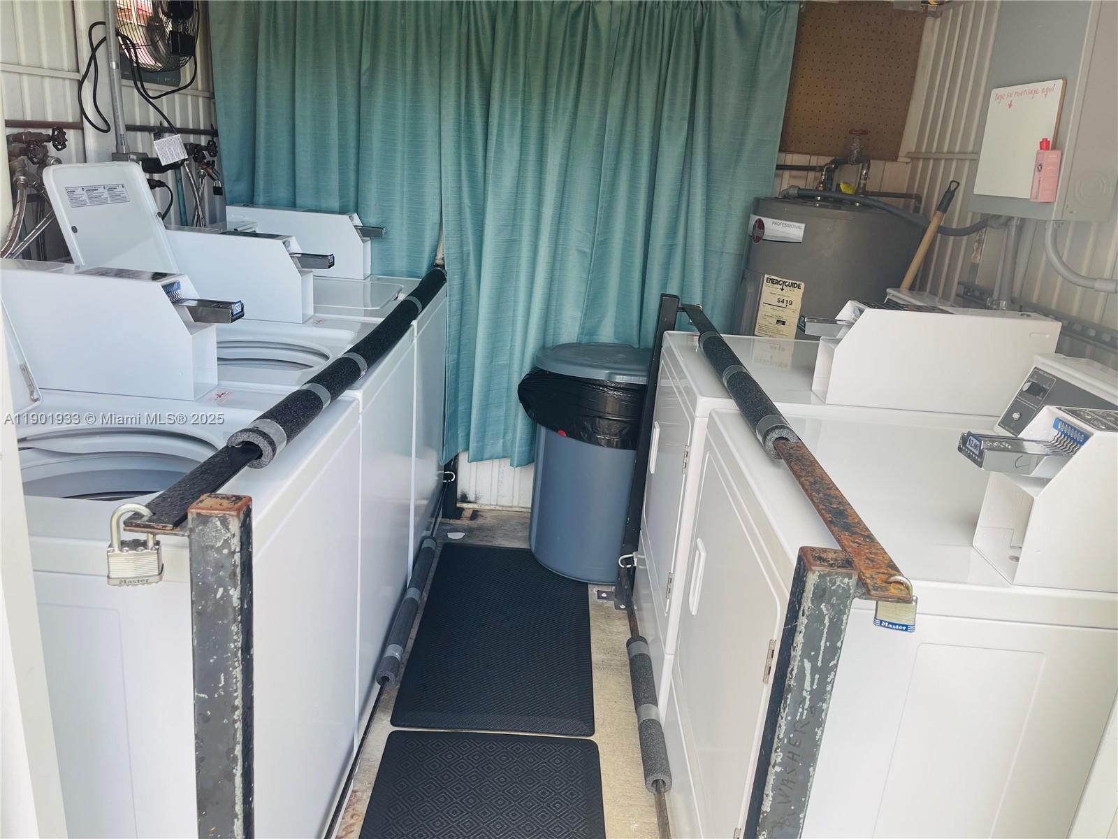 61 West 23rd Street, Unit 104 Hialeah, FL 33010 - Photo 15 of 17 a utility room with dryer and washer