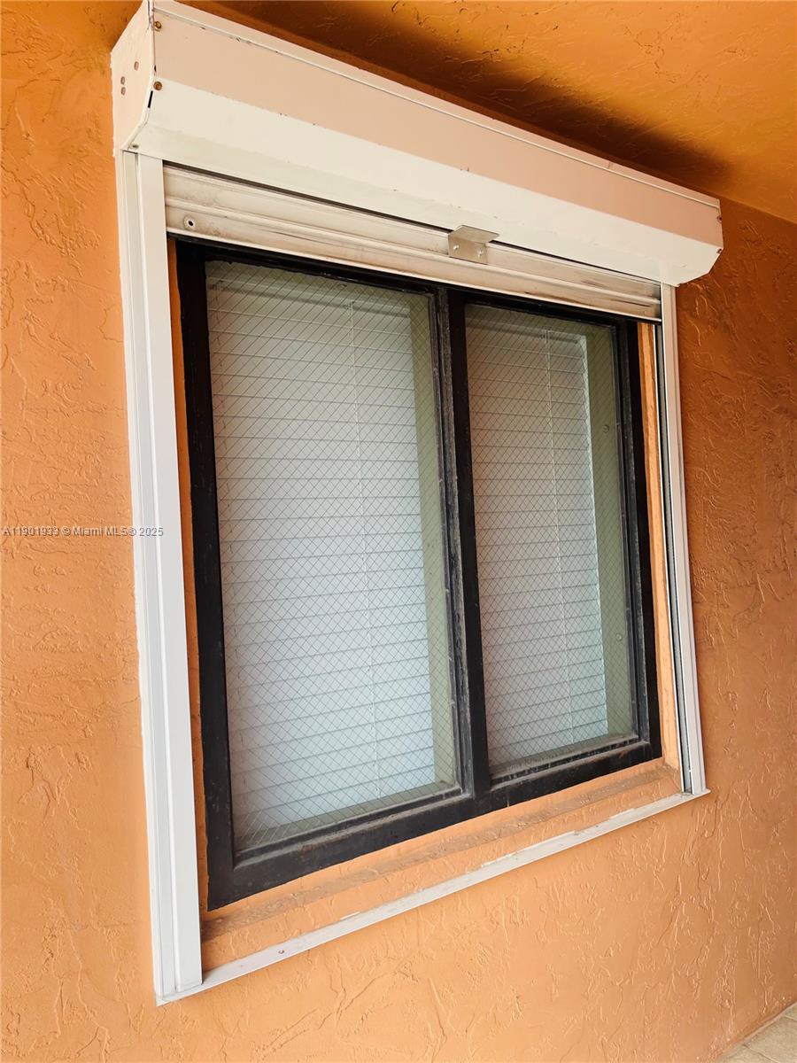 61 West 23rd Street, Unit 104 Hialeah, FL 33010 - Photo 3 of 17 a view of front door