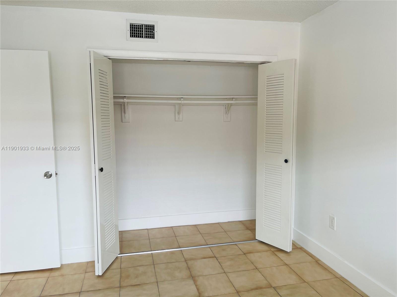 61 West 23rd Street, Unit 104 Hialeah, FL 33010 - Photo 5 of 17 a view of an empty room