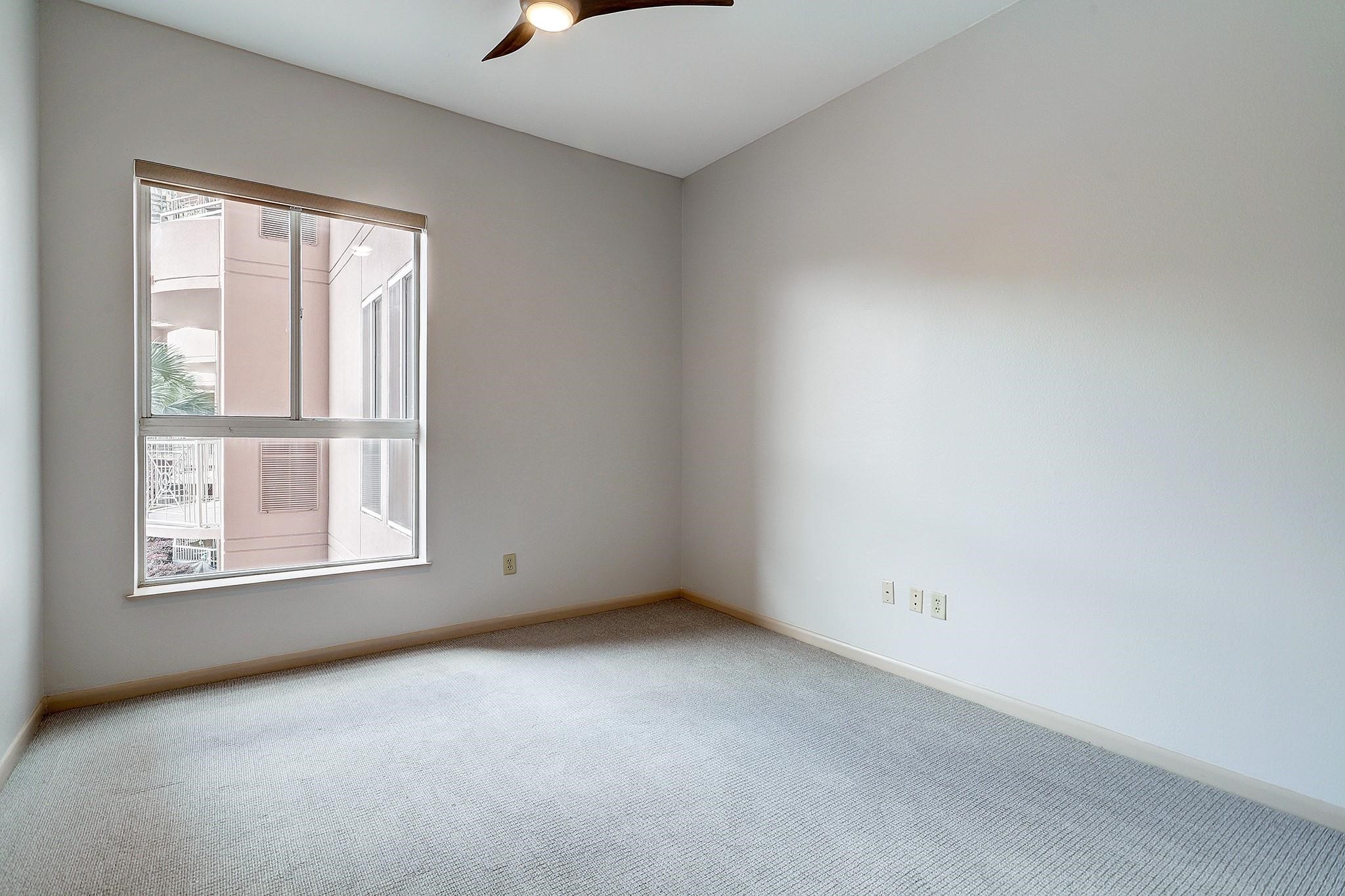 3505 Sage Road, Unit 207 Houston, TX 77056 - Photo 10 of 21 The bedroom is tucked away just off the living room and includes brand new carpet.