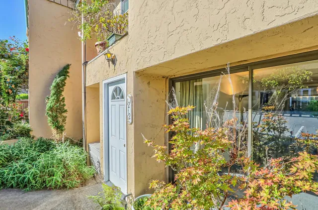 front view of a house with a blue shower