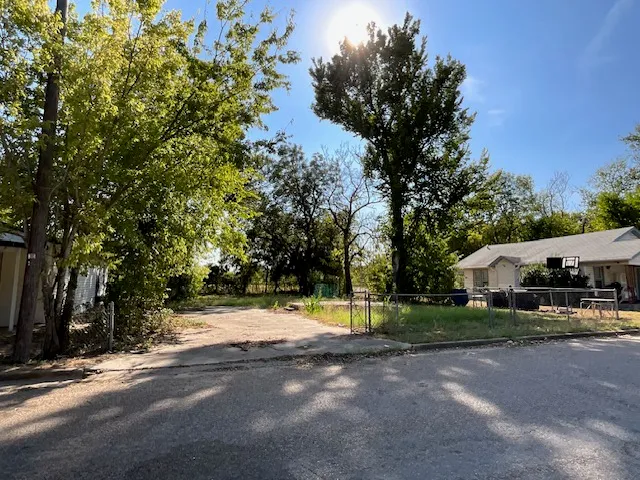 a view of a street with houses