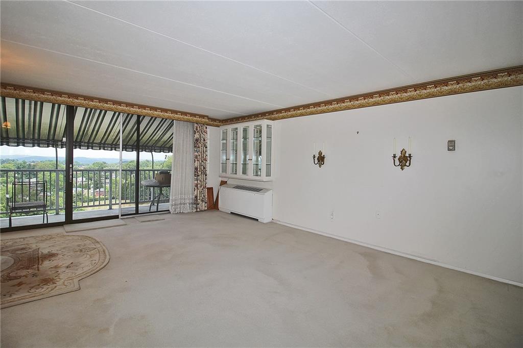 1150 Bower Hill Road, Unit 912A Pittsburgh, PA 15243 - Photo 14 of 39 a view of an empty room with windows