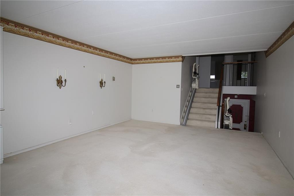 1150 Bower Hill Road, Unit 912A Pittsburgh, PA 15243 - Photo 16 of 39 a view of an empty room with a fireplace
