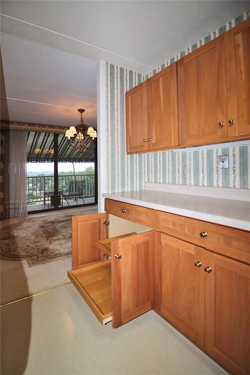 1150 Bower Hill Road, Unit 912A Pittsburgh, PA 15243 - Photo 22 of 39 a kitchen with a sink and large window