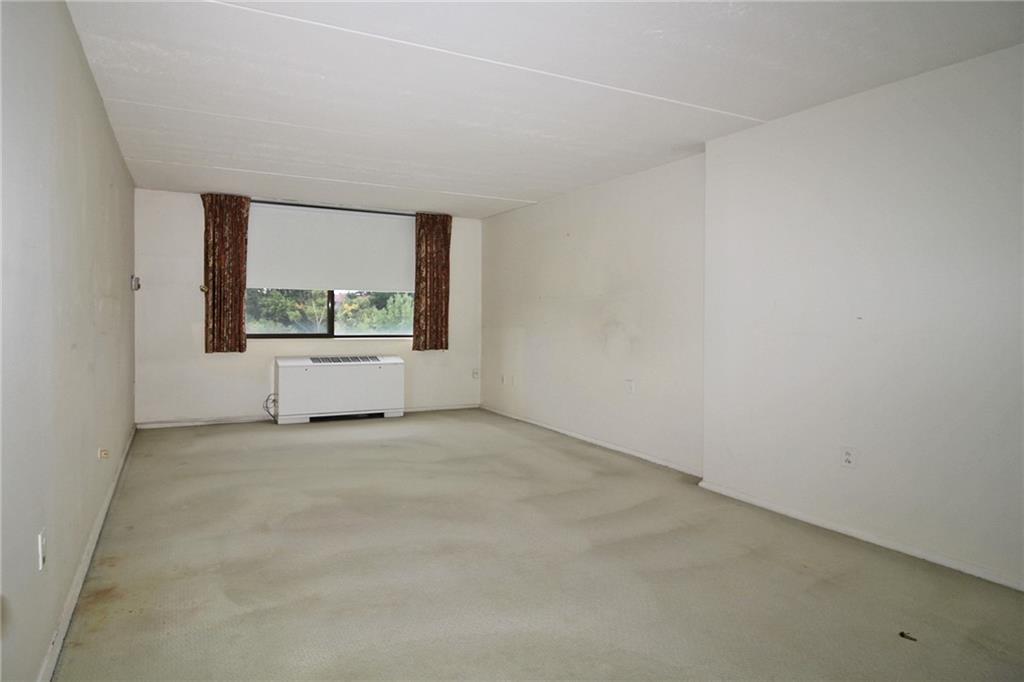 1150 Bower Hill Road, Unit 912A Pittsburgh, PA 15243 - Photo 26 of 39 an empty room with a window