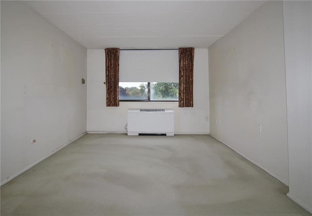 1150 Bower Hill Road, Unit 912A Pittsburgh, PA 15243 - Photo 27 of 39 an empty room with a window