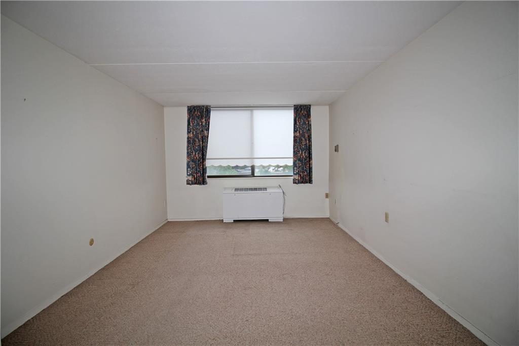 1150 Bower Hill Road, Unit 912A Pittsburgh, PA 15243 - Photo 31 of 39 an empty room with a window