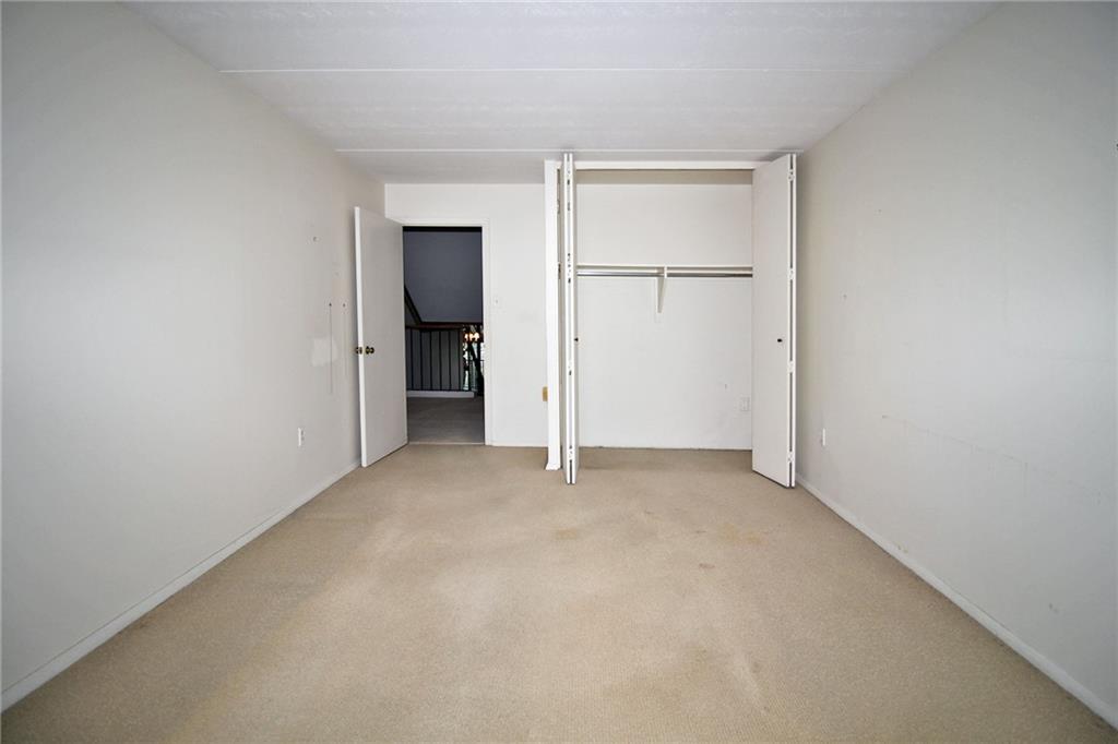 1150 Bower Hill Road, Unit 912A Pittsburgh, PA 15243 - Photo 32 of 39 a view of an empty room with closet
