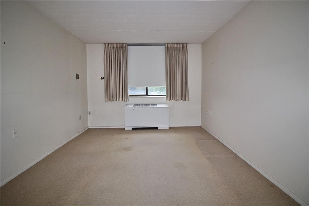 1150 Bower Hill Road, Unit 912A Pittsburgh, PA 15243 - Photo 33 of 39 an empty room with a window