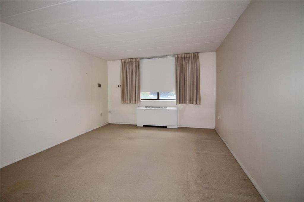 1150 Bower Hill Road, Unit 912A Pittsburgh, PA 15243 - Photo 34 of 39 a view of an empty room with a window