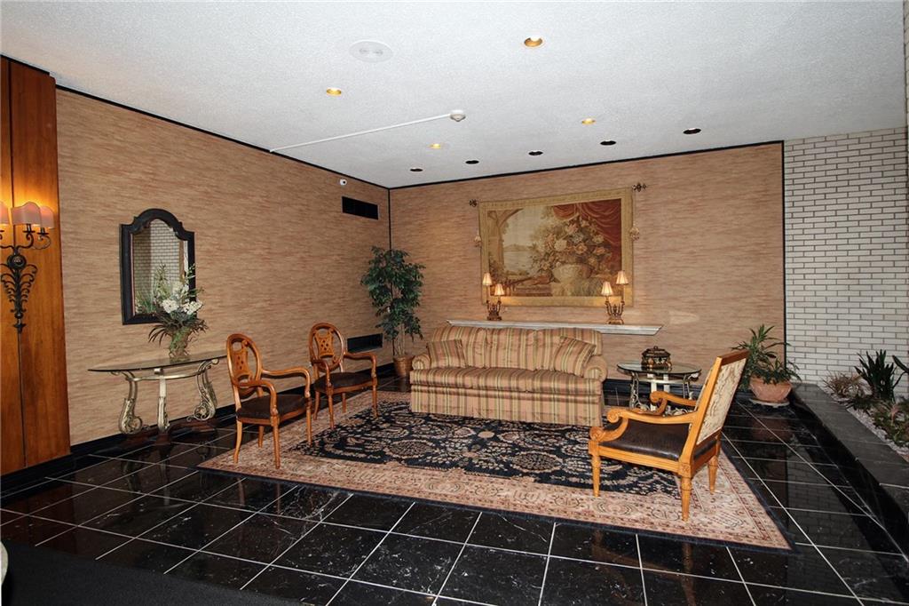 1150 Bower Hill Road, Unit 912A Pittsburgh, PA 15243 - Photo 4 of 39 a backyard of a house with table and chairs