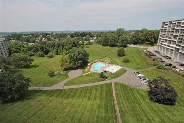 a view of a lake with a yard
