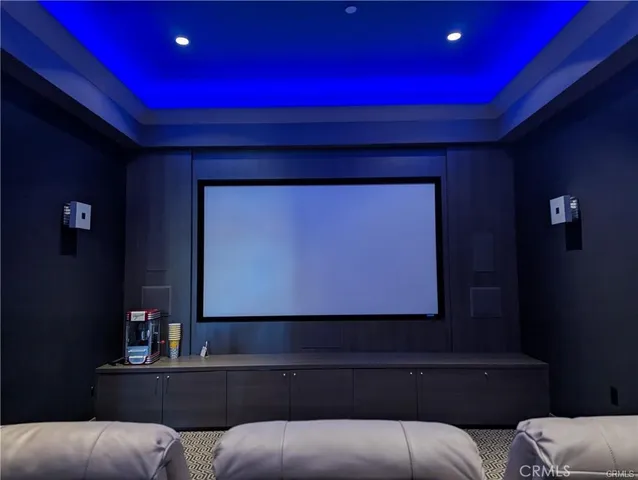 a living room with a couch and a flat screen tv