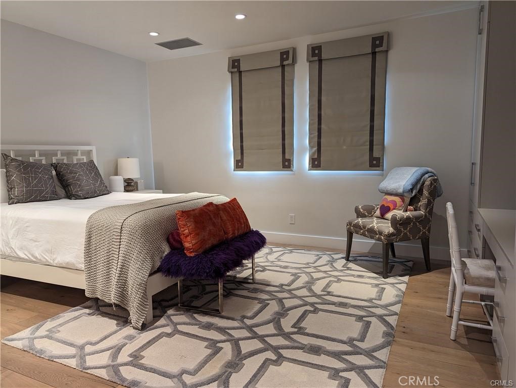 17950 Rancho Street Encino, CA 91316 - Photo 26 of 35 a bedroom with a bed and a window