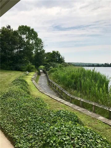 a view of a street with a yard