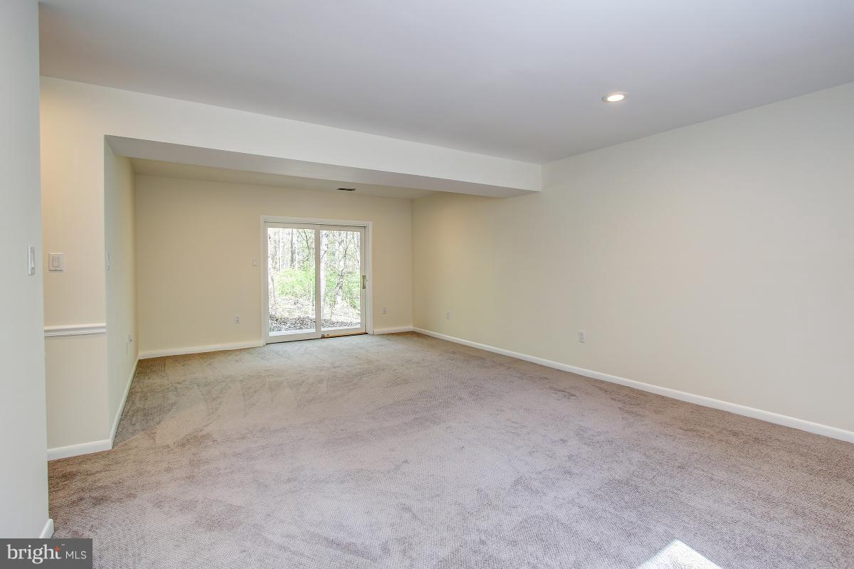 2274 Crows Nest Lane Reston, VA 20191 - Photo 25 of 30 Rec Room with new paint & carpet!
