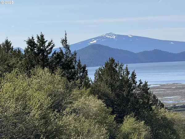 a view of a mountain view with mountains in the background