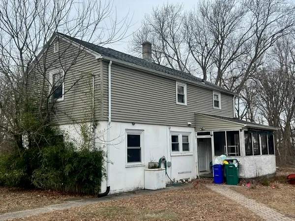 a front view of a house with a patio