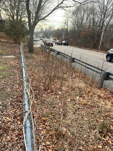 a view of a yard covered with snow