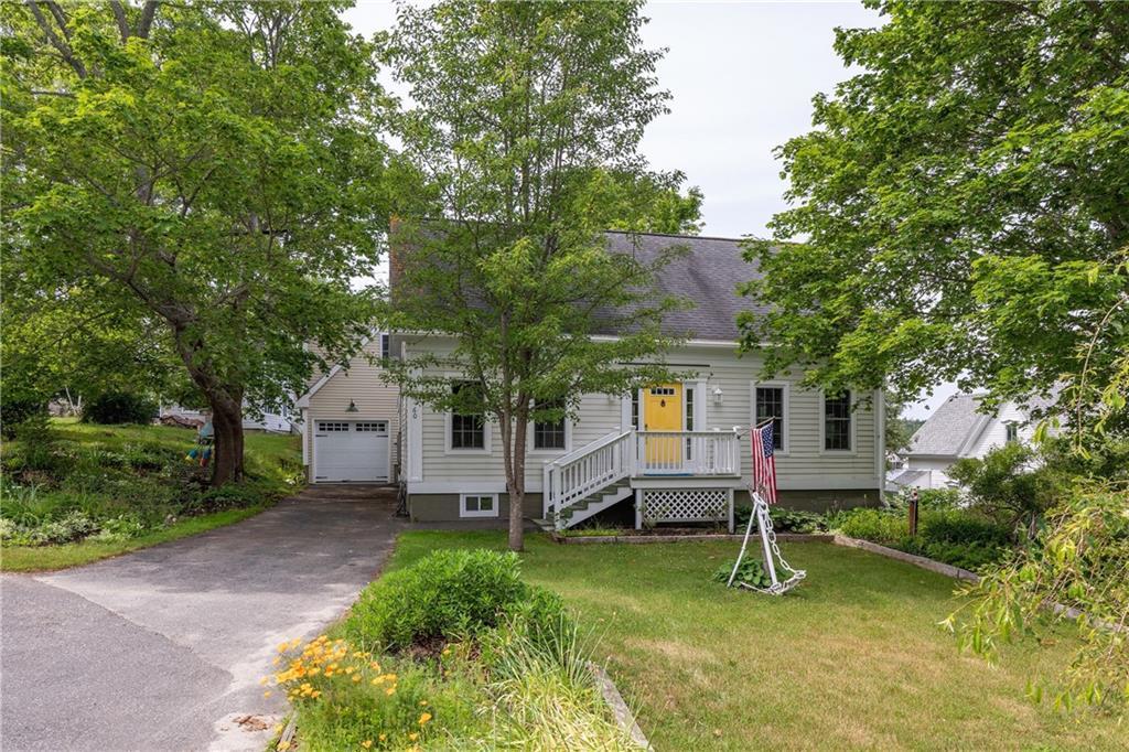 60 Lowells Cove Road Orrs Island, ME 04066 - Photo 2 of 27 The cape-style house with a 1-car...